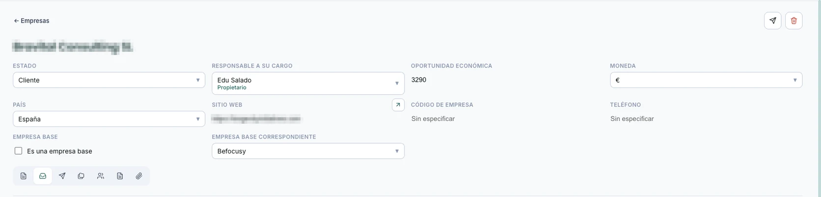 Real screenshot of a company record in WorkOS: name, status, person responsible, economic opportunity, currency, country, website, base company and the tab bar